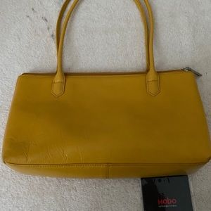 Yellow handbag with handles